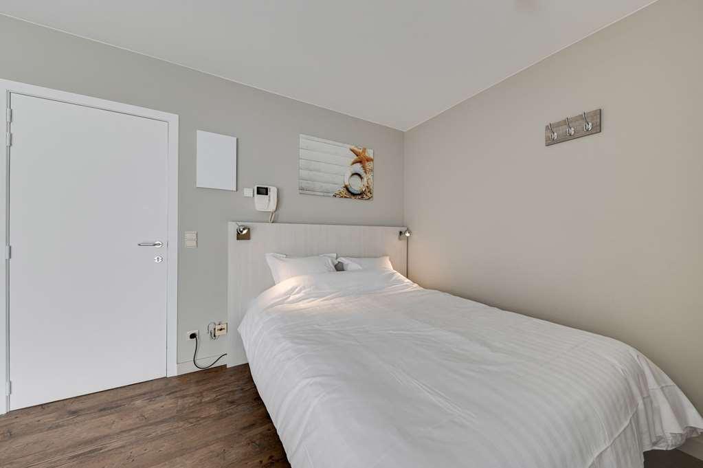 Holiday Suites Де-Ган Номер фото